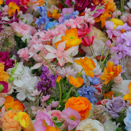 Bright and Vibrant 5D Artificial Flower Wall with Orange and Yellow Blooms for Garden Parties