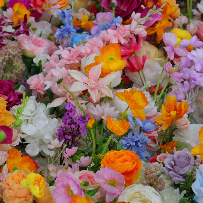 Bright and Vibrant 5D Artificial Flower Wall with Orange and Yellow Blooms for Garden Parties