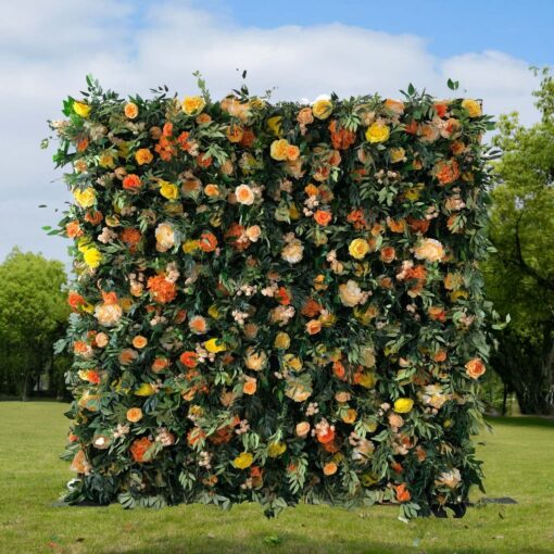 Rustic Autumn Party Decor: Orange and Yellow Flower Wall with Greenery