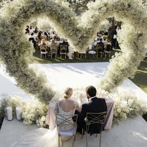 Timeless Heart-Shaped Arch Wedding Backdrop for a Rustic Outdoor Wedding