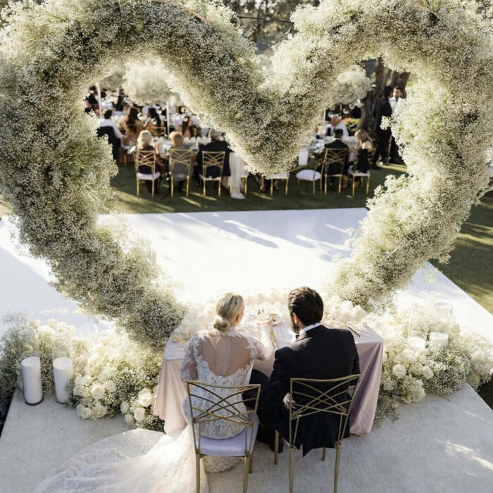 Timeless Heart-Shaped Arch Wedding Backdrop for a Rustic Outdoor Wedding