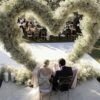 Timeless Heart-Shaped Arch Wedding Backdrop for a Rustic Outdoor Wedding