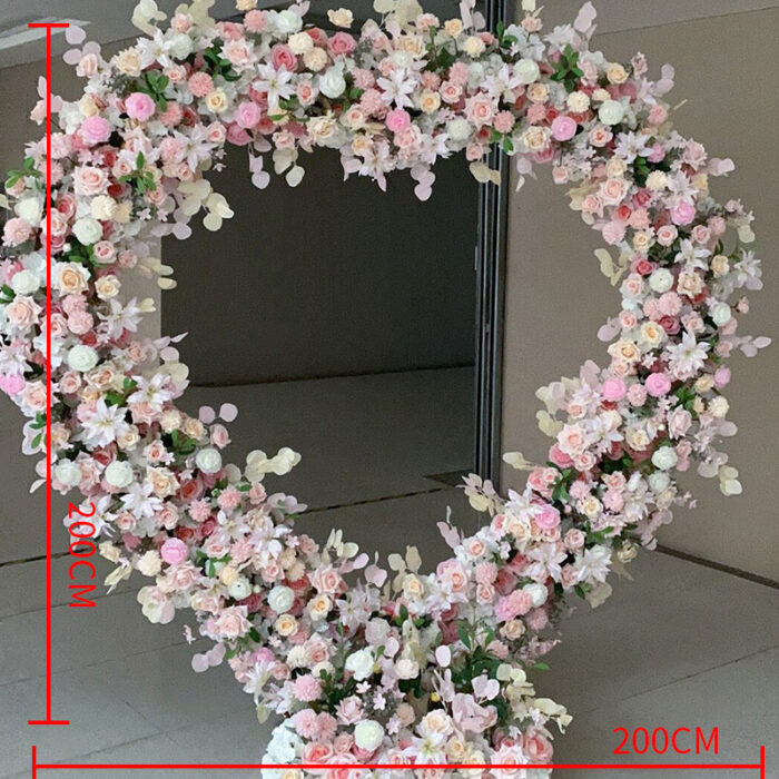 Sophisticated Heart-Shaped Arch with Pink and White Flowers for a Spring Wedding Backdrop