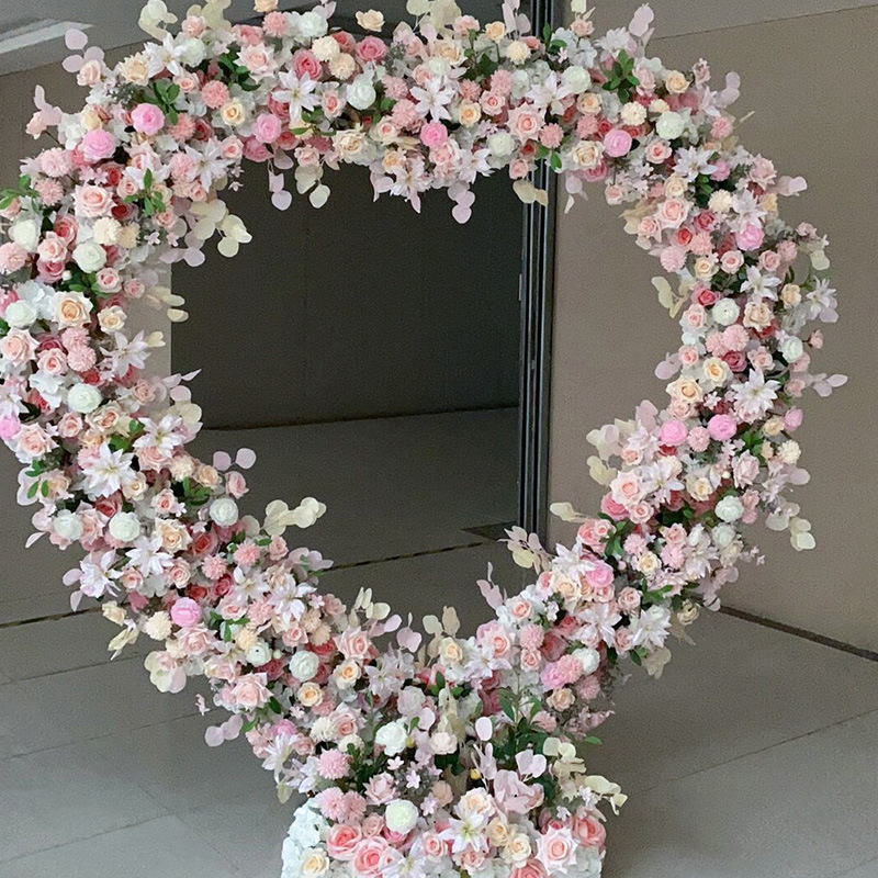 Sophisticated Heart-Shaped Arch with Pink and White Flowers for a Spring Wedding Backdrop