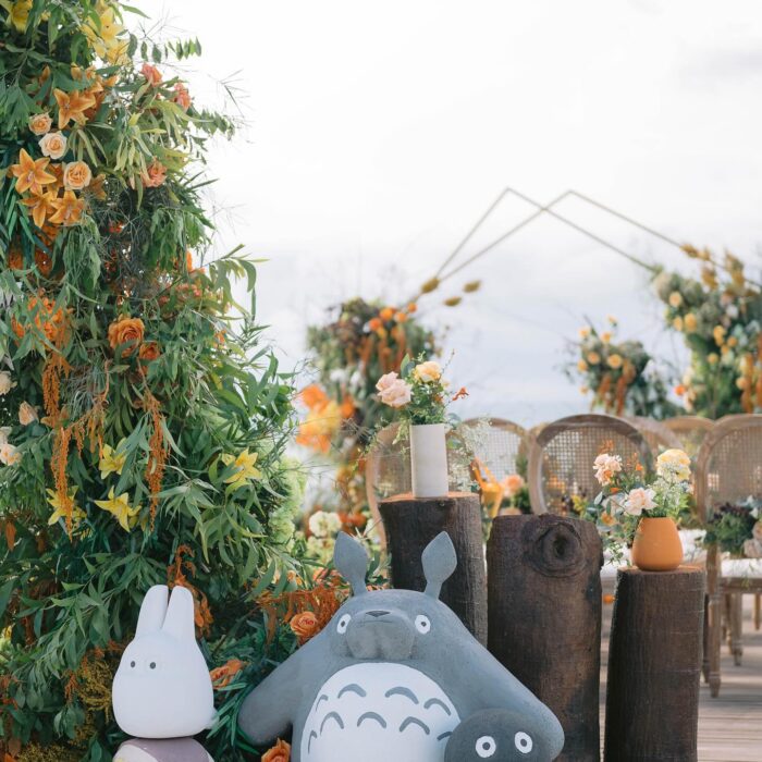 A Dreamy Ghibli-Themed Bali Wedding with Totoro Arch and Orange Floral Accents