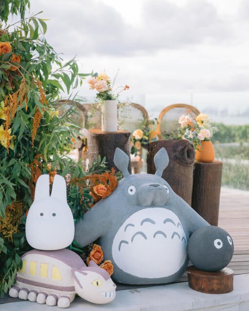 A Dreamy Ghibli-Themed Bali Wedding with Totoro Arch and Orange Floral Accents
