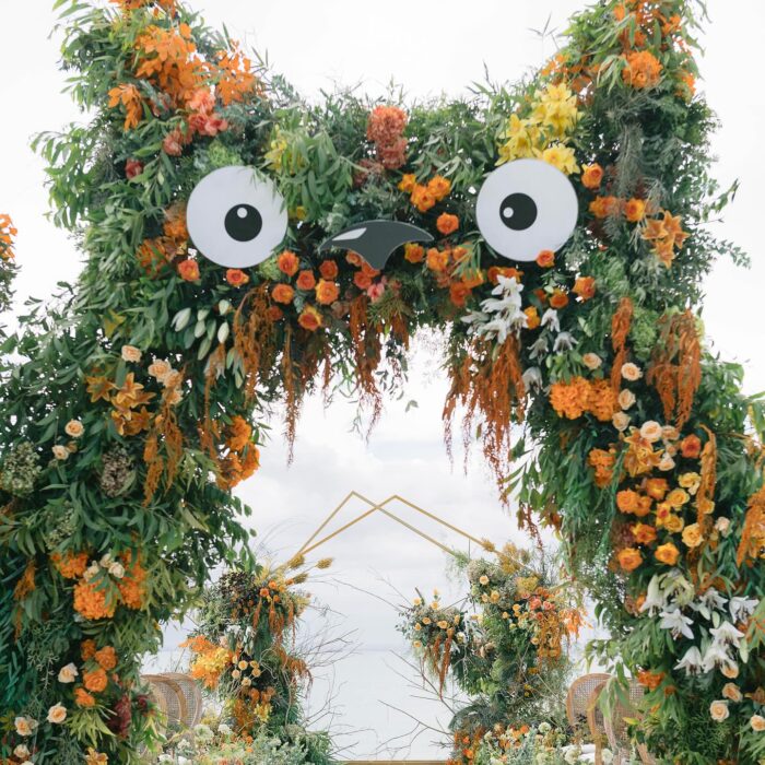 A Dreamy Ghibli-Themed Bali Wedding with Totoro Arch and Orange Floral Accents