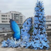 Beautiful Butterfly Backdrop with Blue Roses and White Floral Accents for Events
