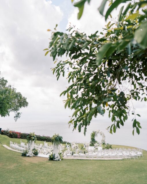 https://eventflowerwall.com/wp-content/uploads/2024/12/Beautiful-Greenery-and-White-Flower-Circle-Wedding-Arch-for-Romantic-Ceremonies-6.jpg