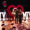 Beautiful Red Rose Flower Arch with Heart Design for a Memorable Proposal