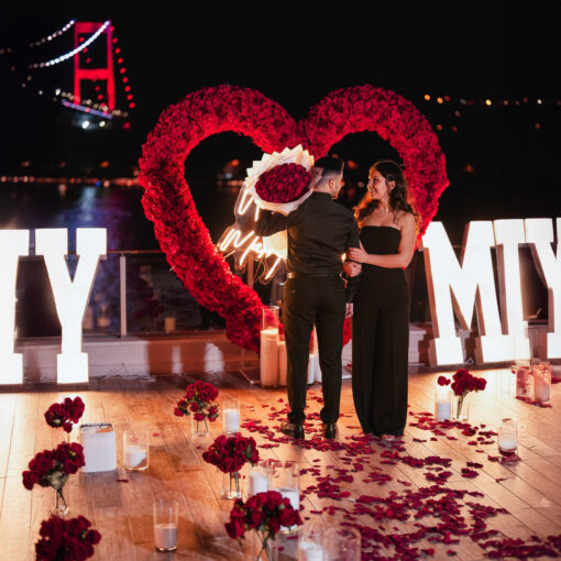 Beautiful Red Rose Flower Arch with Heart Design for a Memorable Proposal