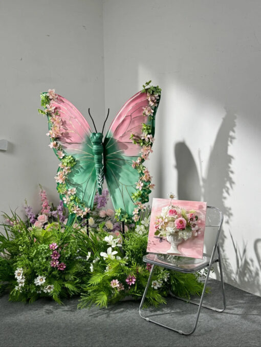 Blush Pink and Mint Green Butterfly Backdrop with Vibrant Spring Artificial Flower Display