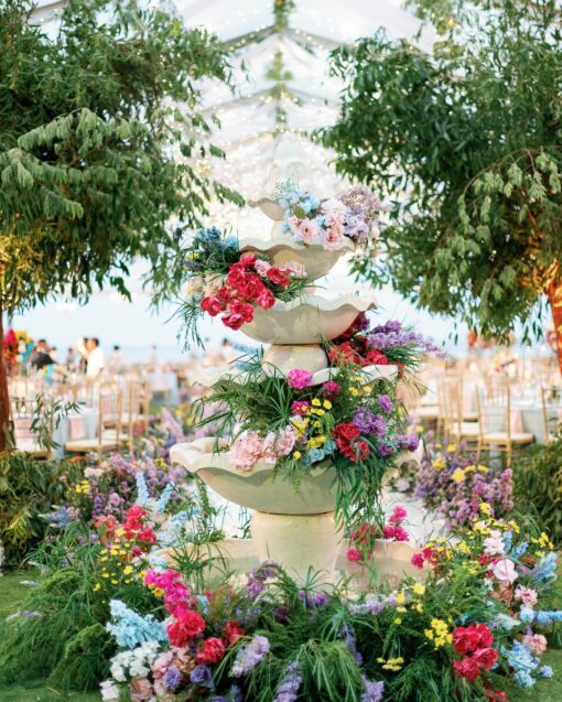 Bohemian Rainbow Garden Wedding in Bali: Square Green Wall & Colorful Floral Topper