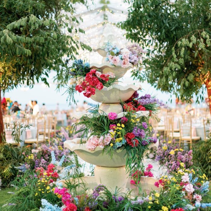 Bohemian Rainbow Garden Wedding in Bali: Square Green Wall & Colorful Floral Topper
