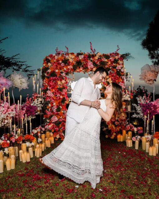 Boho-Inspired Square Arch with Floral Accents for a Dreamy Wedding Celebration