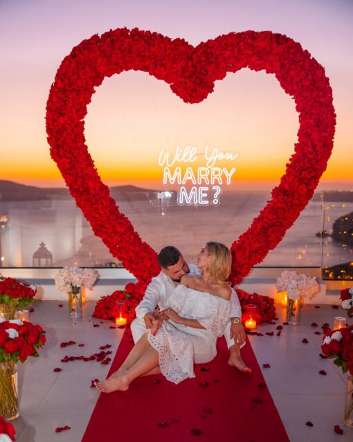 Bold Red Rose Heart Arch for a Striking Proposal with Luxuriant Blooms