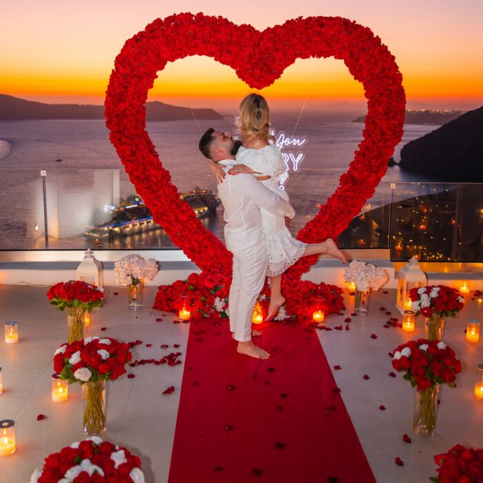 Bold Red Rose Heart Arch for a Striking Proposal with Luxuriant Blooms