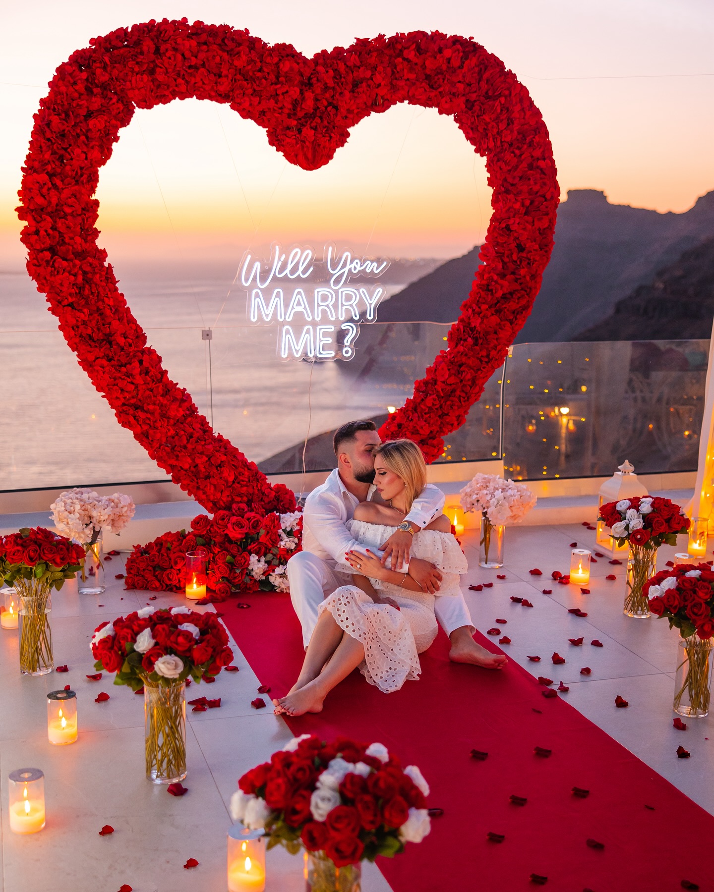Bold Red Rose Heart Arch for a Striking Proposal with Luxuriant Blooms