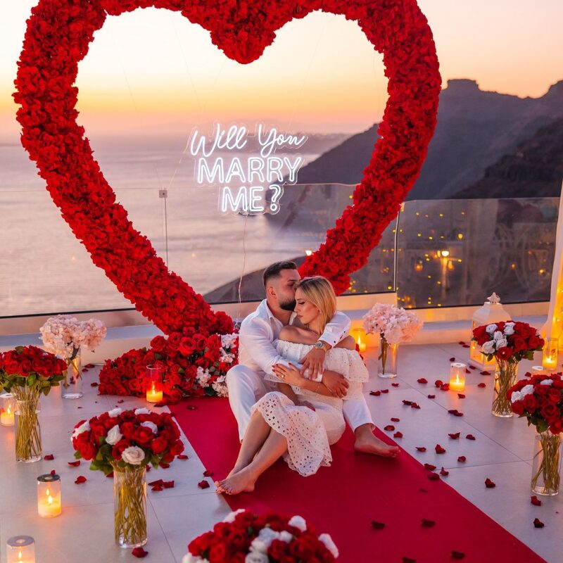 Bold Red Rose Heart Arch for a Striking Proposal with Luxuriant Blooms