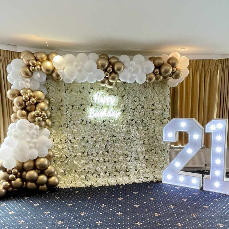 Charming White Flower Wall with Vintage Flower Art for Elegant Birthday Celebrations