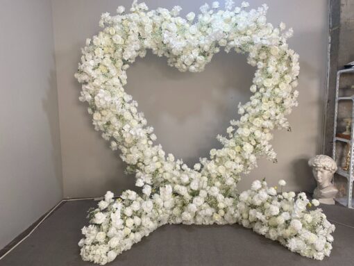 Chic Heart-Shaped Arch with White Roses and Baby’s Breath for Romantic Wedding Decor