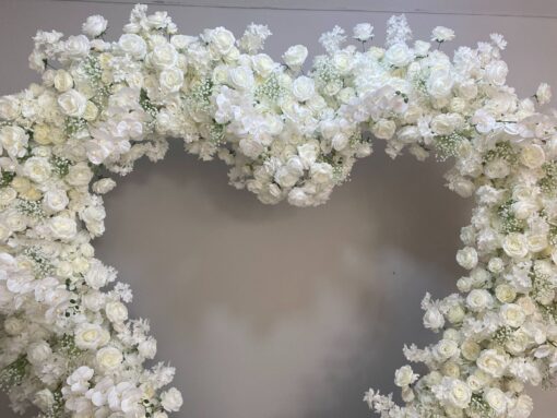 Chic Heart-Shaped Arch with White Roses and Baby’s Breath for Romantic Wedding Decor