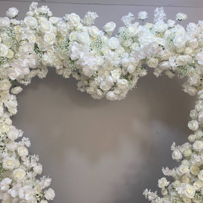 Chic Heart-Shaped Arch with White Roses and Baby’s Breath for Romantic Wedding Decor