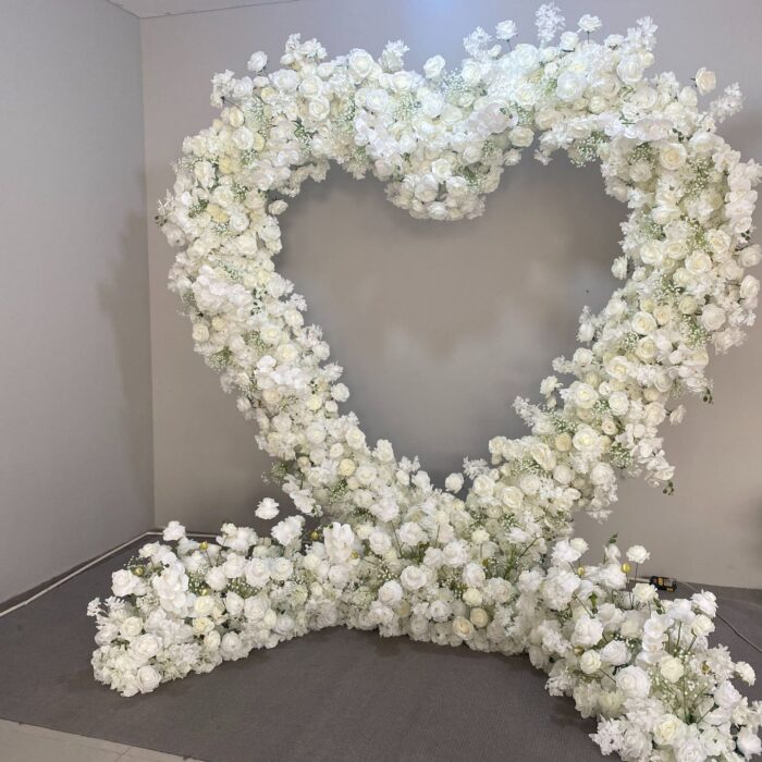 Chic Heart-Shaped Arch with White Roses and Baby’s Breath for Romantic Wedding Decor