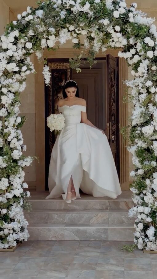 Classic Wedding Arch with White Roses and Greenery for a Perfect Wedding Backdrop