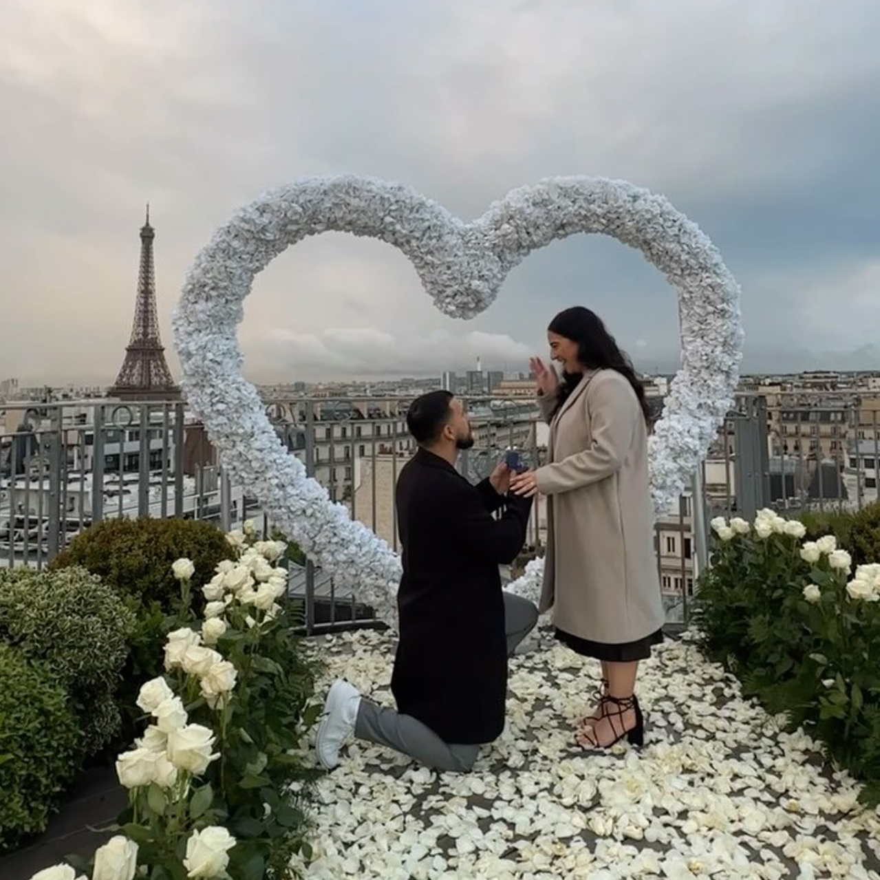 Create a Dreamy Proposal with a White Rose Heart-Shaped Arch Backdrop