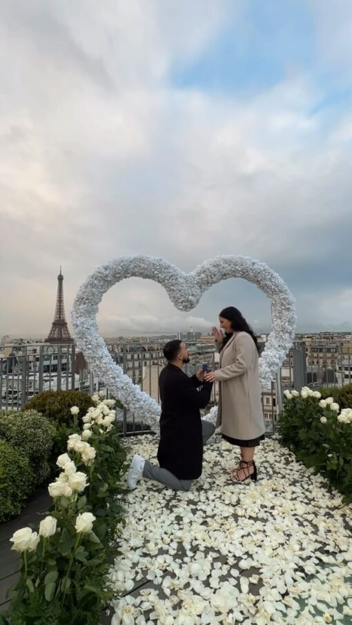 Create a Dreamy Proposal with a White Rose Heart-Shaped Arch Backdrop