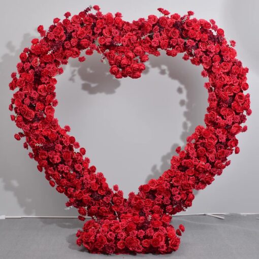 Dazzling Heart-Shaped Wedding Arch with Red Roses for a Grand Wedding Backdrop