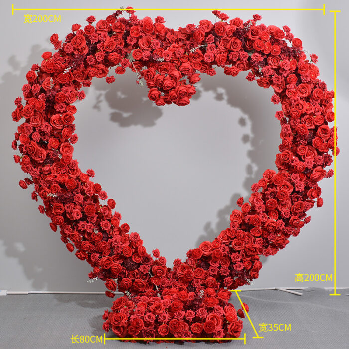 Dazzling Heart-Shaped Wedding Arch with Red Roses for a Grand Wedding Backdrop
