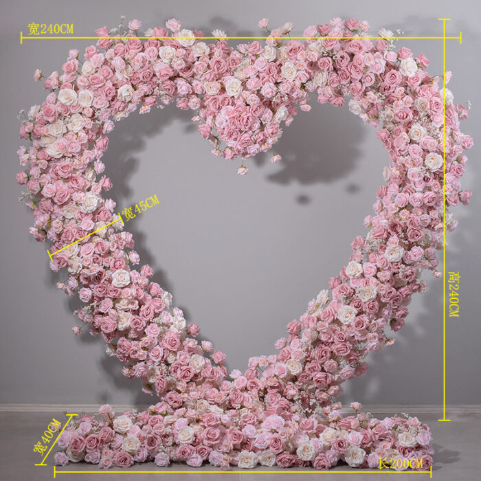 Delicate Heart-Shaped Arch with Soft Pink and Beige Roses for a Serene Wedding Atmosphere