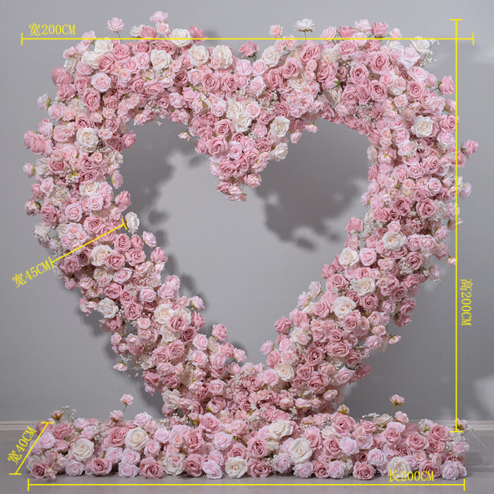 Delicate Heart-Shaped Arch with Soft Pink and Beige Roses for a Serene Wedding Atmosphere