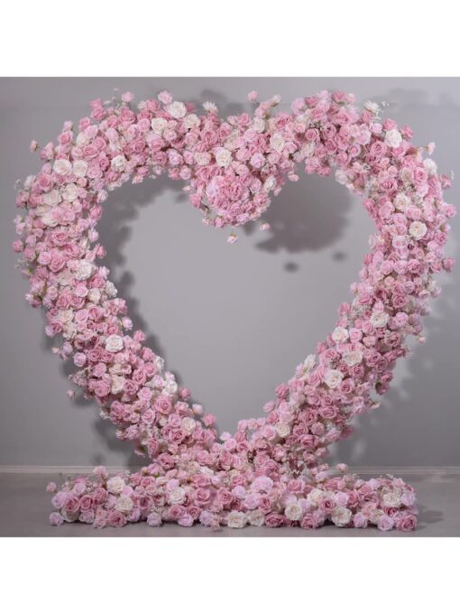 Delicate Heart-Shaped Arch with Soft Pink and Beige Roses for a Serene Wedding Atmosphere