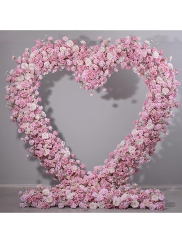 Delicate Heart-Shaped Arch with Soft Pink and Beige Roses for a Serene Wedding Atmosphere