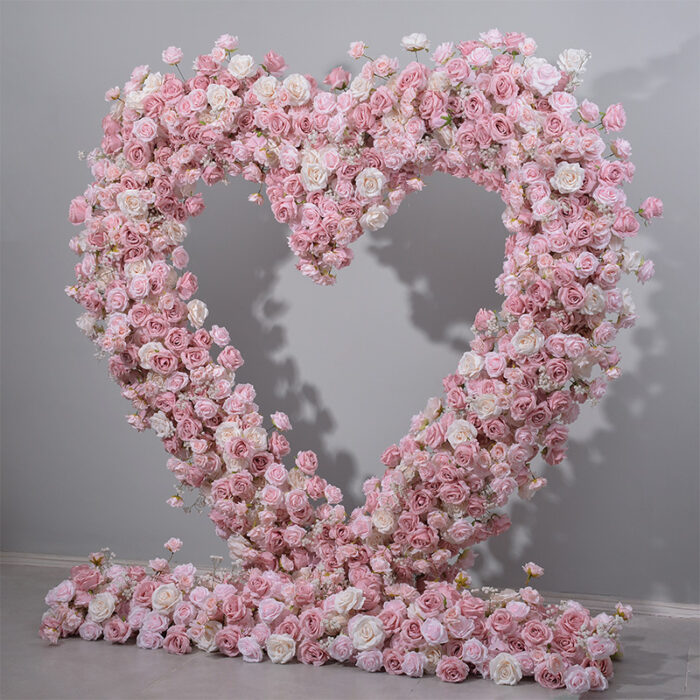 Delicate Heart-Shaped Arch with Soft Pink and Beige Roses for a Serene Wedding Atmosphere