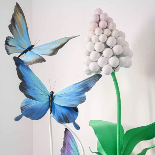 Dreamy Blue Gradient Butterfly Arrangement with Purple Details for Weddings