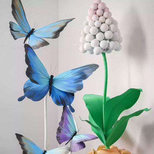 Dreamy Blue Gradient Butterfly Arrangement with Purple Details for Weddings