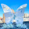 Dreamy Butterfly Backdrop with White Transparent Wings and Blue Floral Accents
