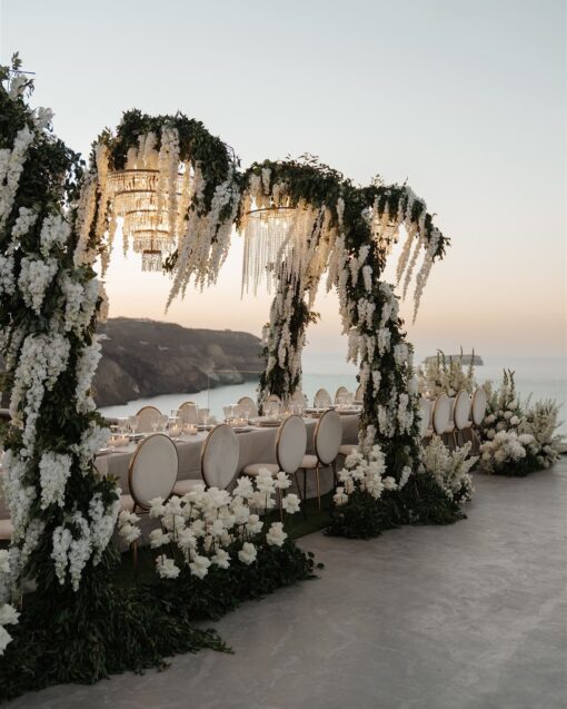 Dreamy White Floral Wedding Arch with Wisteria for a Fairytale Celebration