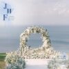 Elegant Bali Wedding: Round Arch Backdrop with White Floral Decorations