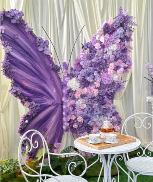Elegant Butterfly Backdrop Featuring Purple Wings and Victorian Floral Arrangements