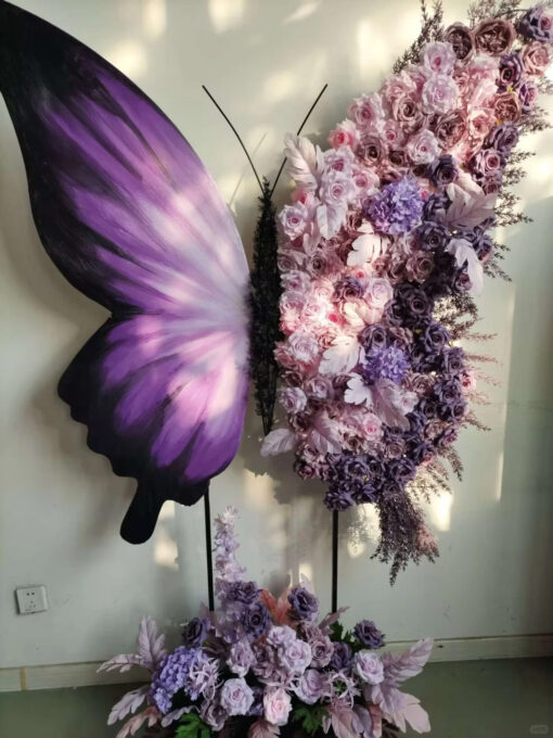 Elegant Butterfly Backdrop with Soft Lavender and Mauve Floral Arrangement