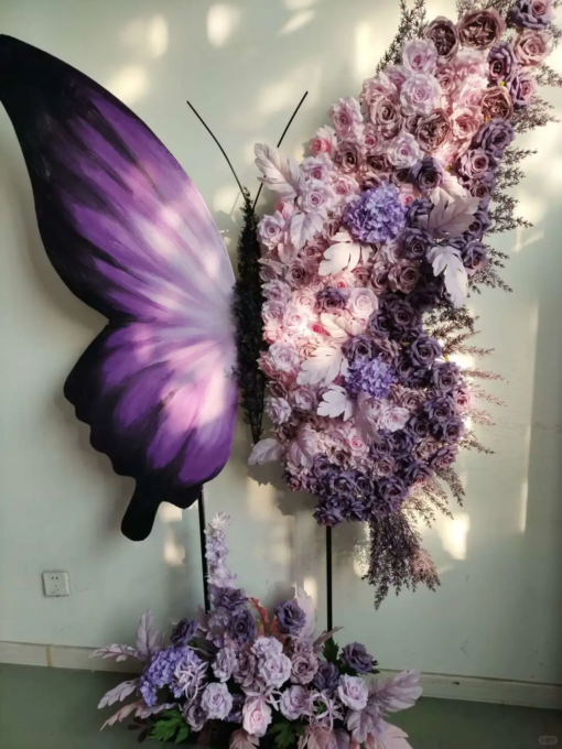 Elegant Butterfly Backdrop with Soft Lavender and Mauve Floral Arrangement