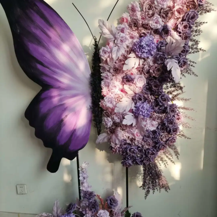 Elegant Butterfly Backdrop with Soft Lavender and Mauve Floral Arrangement