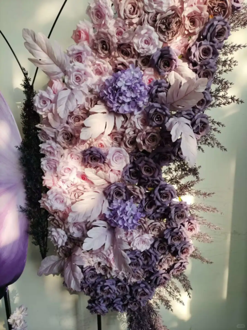 Elegant Butterfly Backdrop with Soft Lavender and Mauve Floral Arrangement