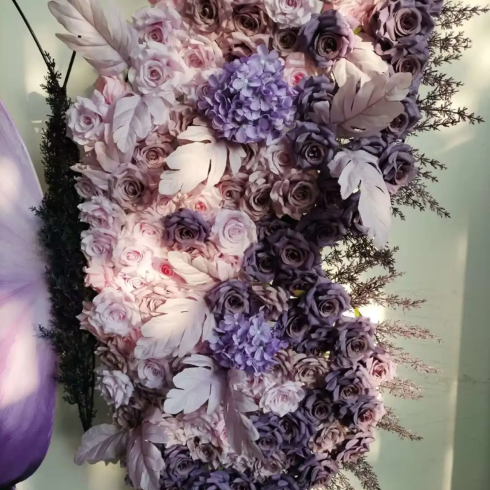 Elegant Butterfly Backdrop with Soft Lavender and Mauve Floral Arrangement