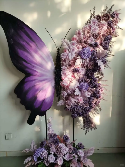 Elegant Butterfly Backdrop with Soft Lavender and Mauve Floral Arrangement